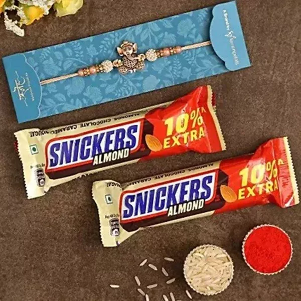Enticing Ganesha Rakhi & Snickers Almond Chocolate - Combo Pack
